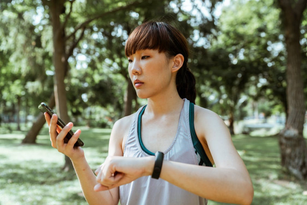 AI personalized wellness app guiding health habits while user checks phone outdoors