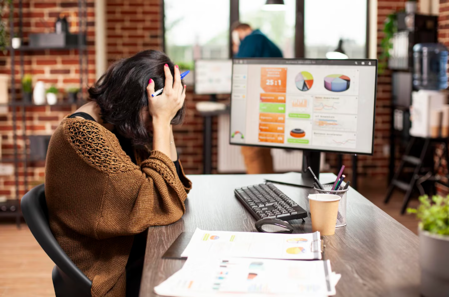 Optimization culture burnout shown in person overwhelmed by productivity boards